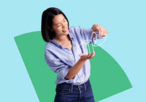 Woman holding geometric model representing innovation and product development at TOPdesk